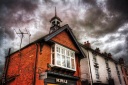 red brick buildings old high street Eccleshall Staffordhire England UK architecture declanod clouds sky